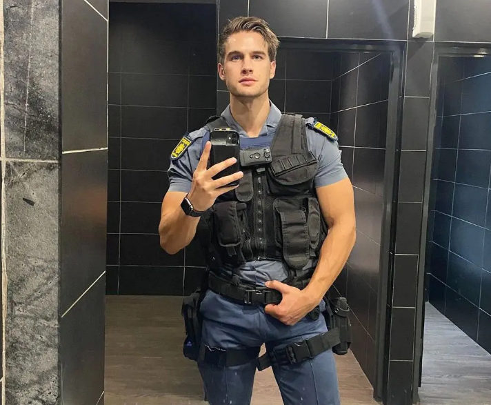 In the spotlight for uniform selfies is Devan Cox, South Africa's "Hot Cop."
